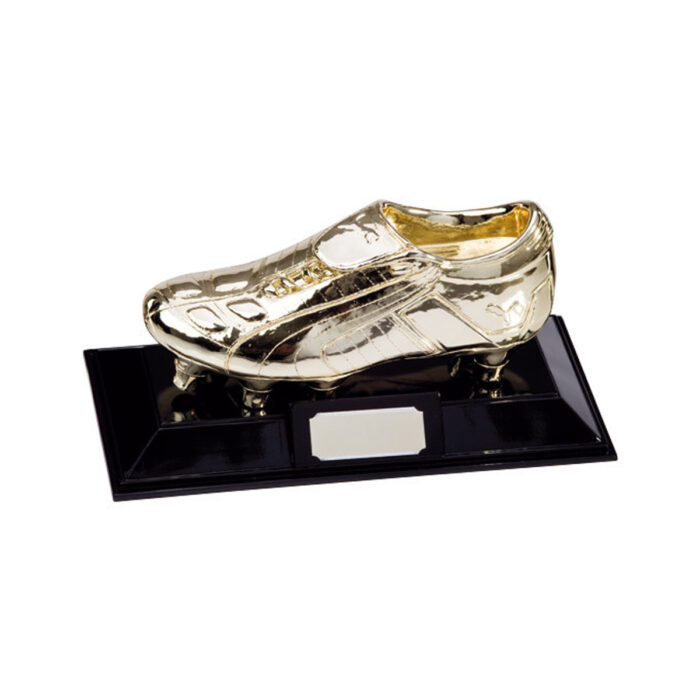 Guldfärgad sko-tematiserad sporttrofé, unik och detaljrik design, möjligen en prisstatyett.